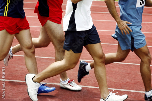 Men running in a race © ImageHit