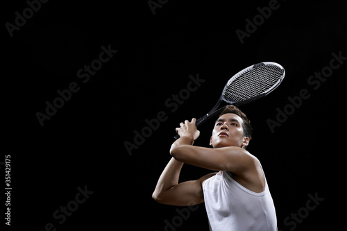 Man playing tennis © ImageHit