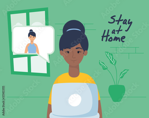 afro woman using laptop to communicate and stay home