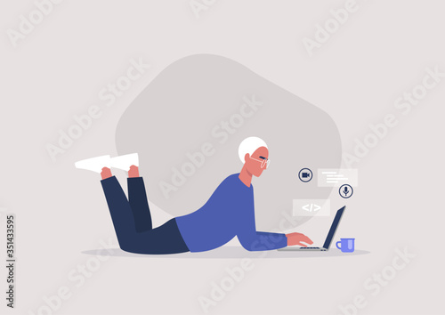 Young male character lying on the floor and typing on a laptop, working from home concept