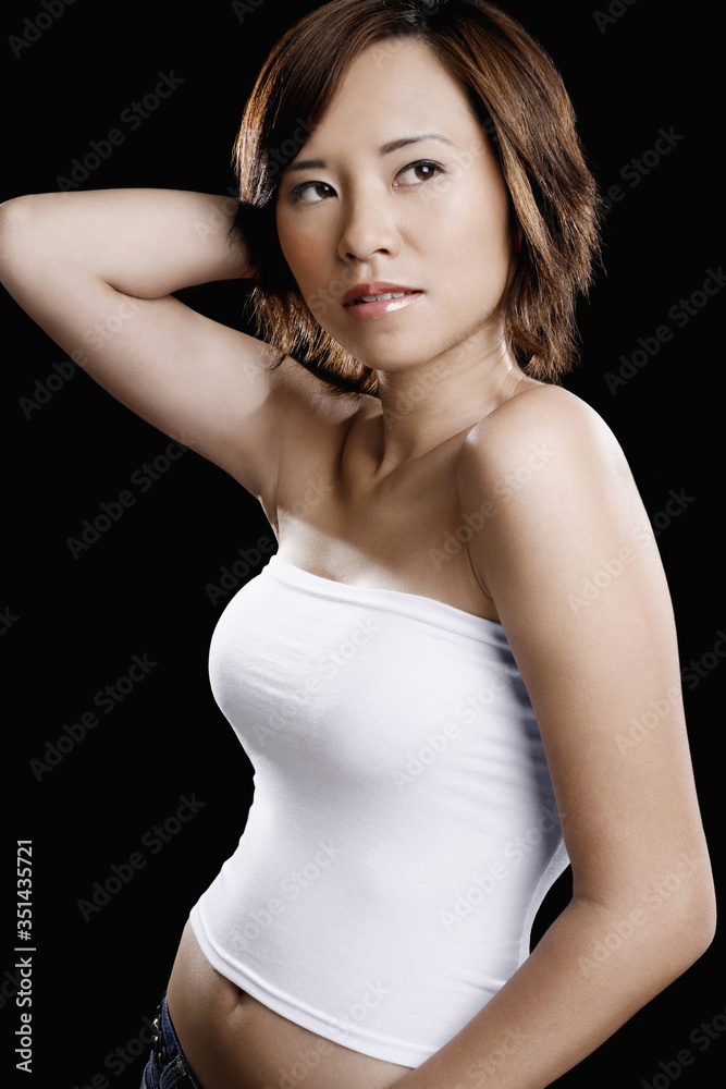 Woman in white tube top posing Woman in white tube top posing