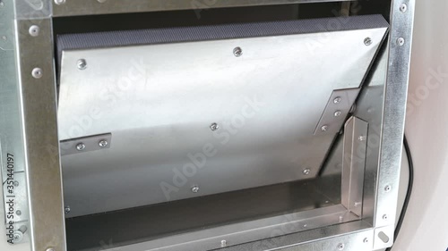 Automatic fire damper. The damper opens and closes