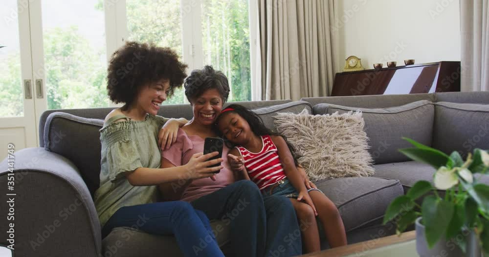 Mixed race woman spending time with her mother and her daughter Mixed race woman spending time with her mother and her daughter