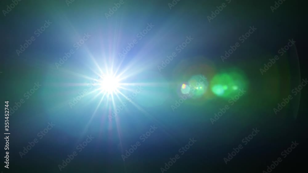 Bright color beam of video projector against dark background