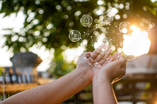 Technology,   Hands holding  globe of tropical nature summer background, © panomporn