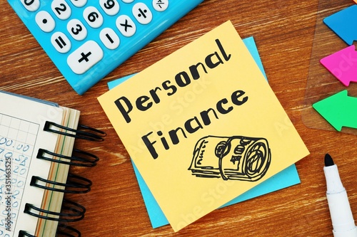 Financial concept meaning Personal Finance with inscription on the piece of paper.