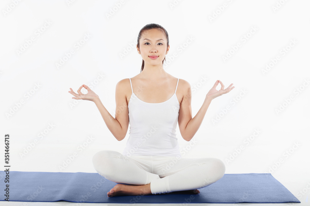 Woman practising yoga Woman practising yoga