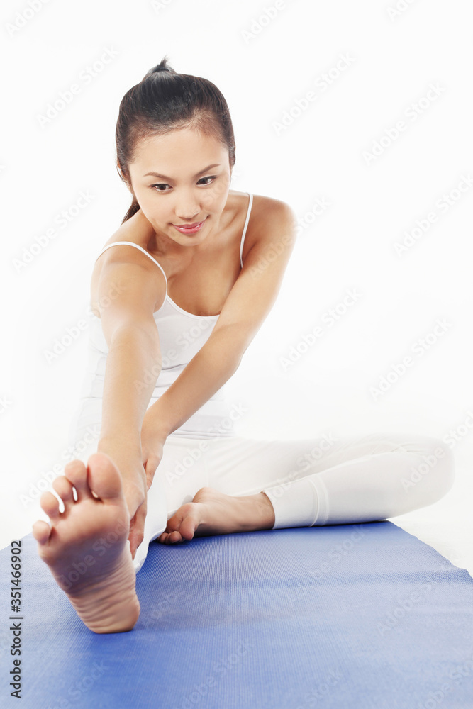 Woman practising yoga Woman practising yoga