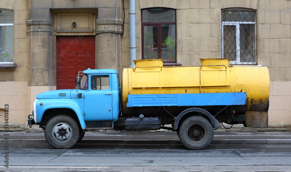 A truck with a tank ulitsa Trefoleva, Saint-Petersburg, Russia August 2017
