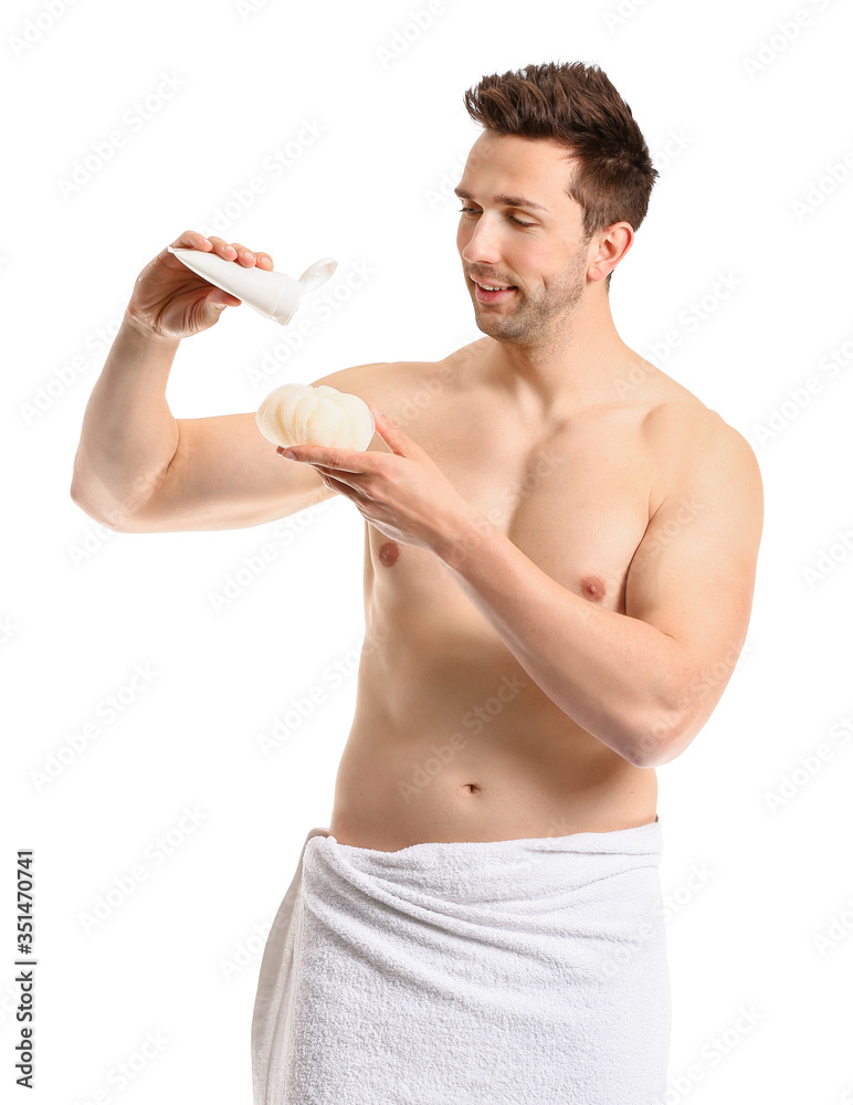 Handsome man with shower gel and loofah on white background Handsome man with shower gel and loofah on white background