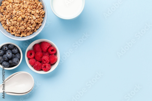 Healthy breakfast with granola, yogurt and berries