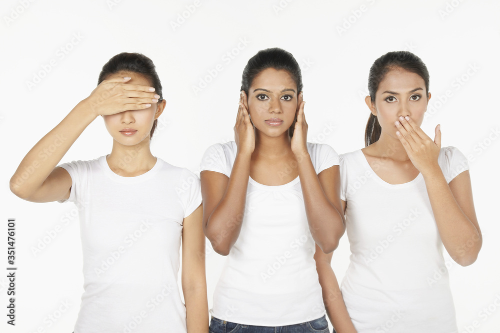 Women portraying the quote, 'See No Evil, Hear No Evil, Speak No Evil'