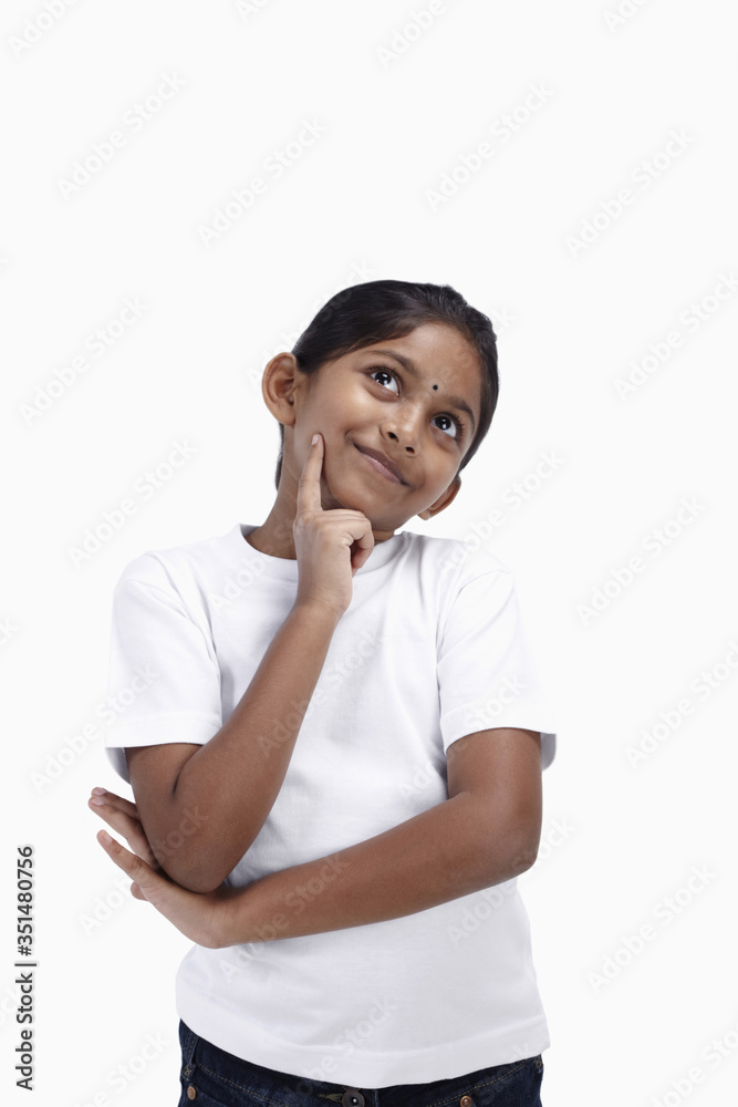 Girl smiling while contemplating Girl smiling while contemplating
