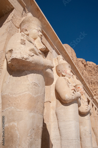 Large statue at an ancient egyptian temple photo