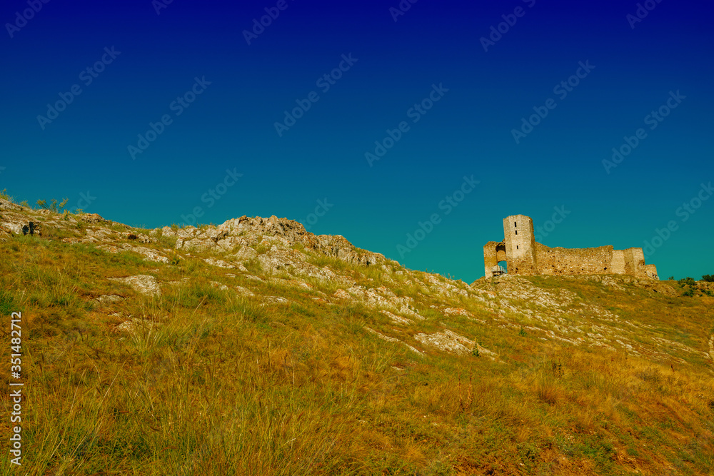 Fototapeta premium the medieval fortress on the hill in the sunlight