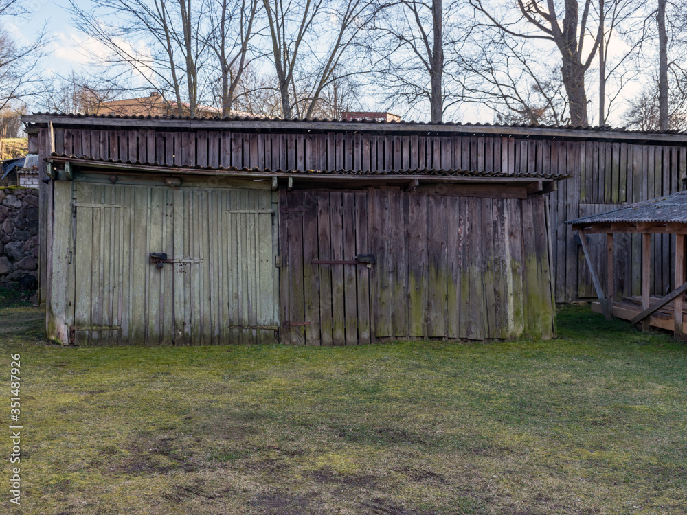 wooden sheds for storing firewood in the yard