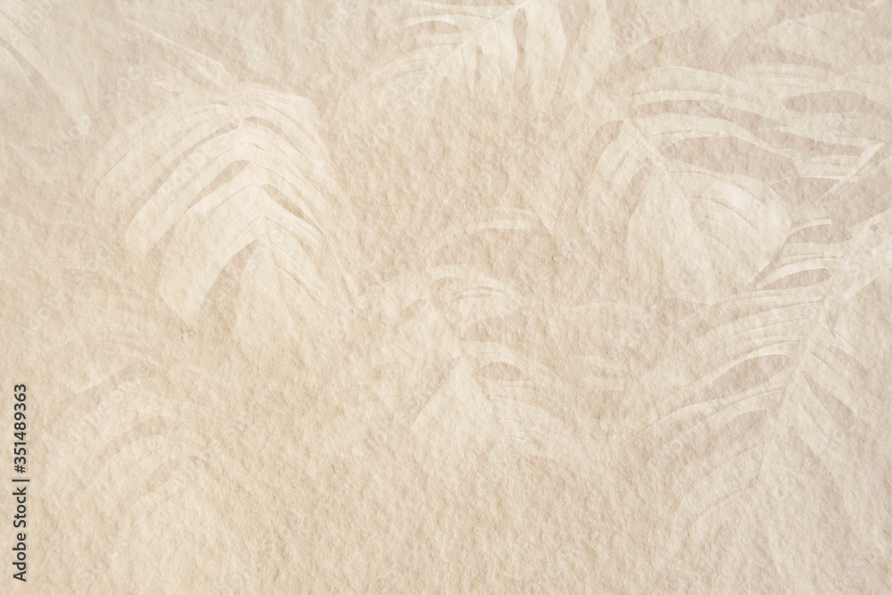 Obraz premium Monstera leaf pattern on a beige cement background illustration