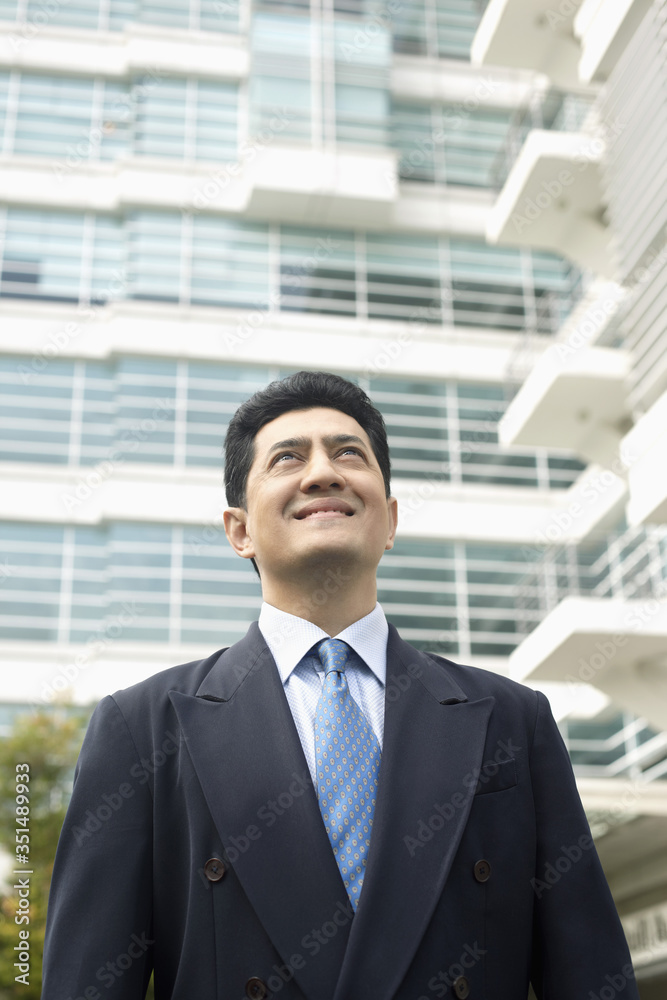 Confident businessman smiling