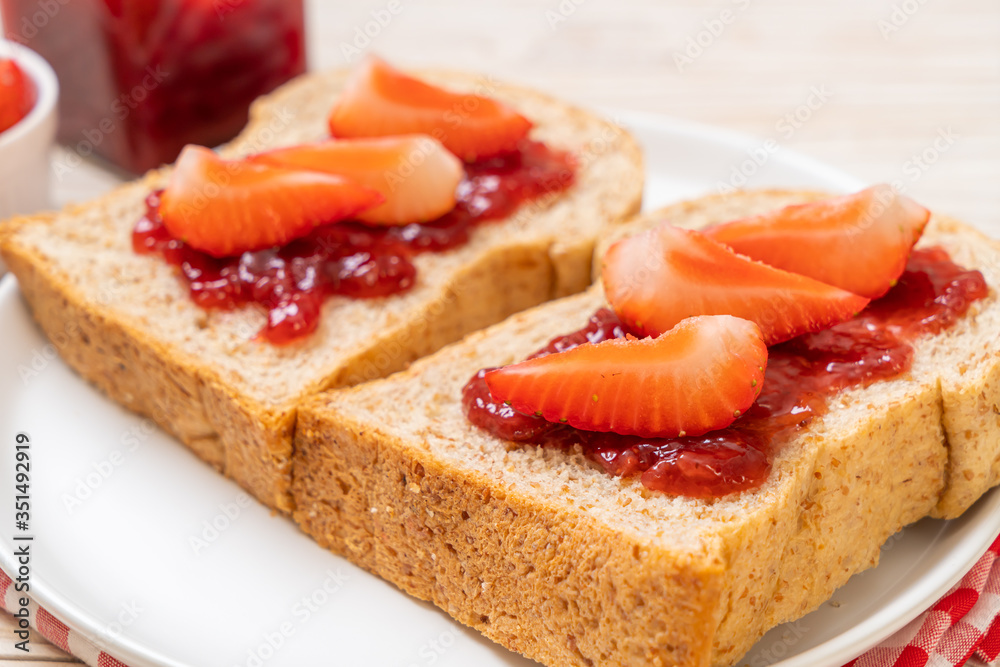 whole wheat bread with strawberry jam and fresh strawberry whole wheat bread with strawberry jam and fresh strawberry