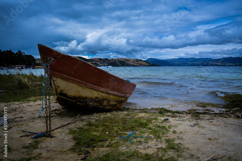 Old boat on the shore of the lake