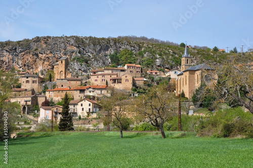 PEYRE, FRANCE, EUROPE, SPRING 2019. Beautiful French village of medieval-style light-colored brick buildings located near the Millau Bridge in the Aveyron region, Midi-Pyrénées photo