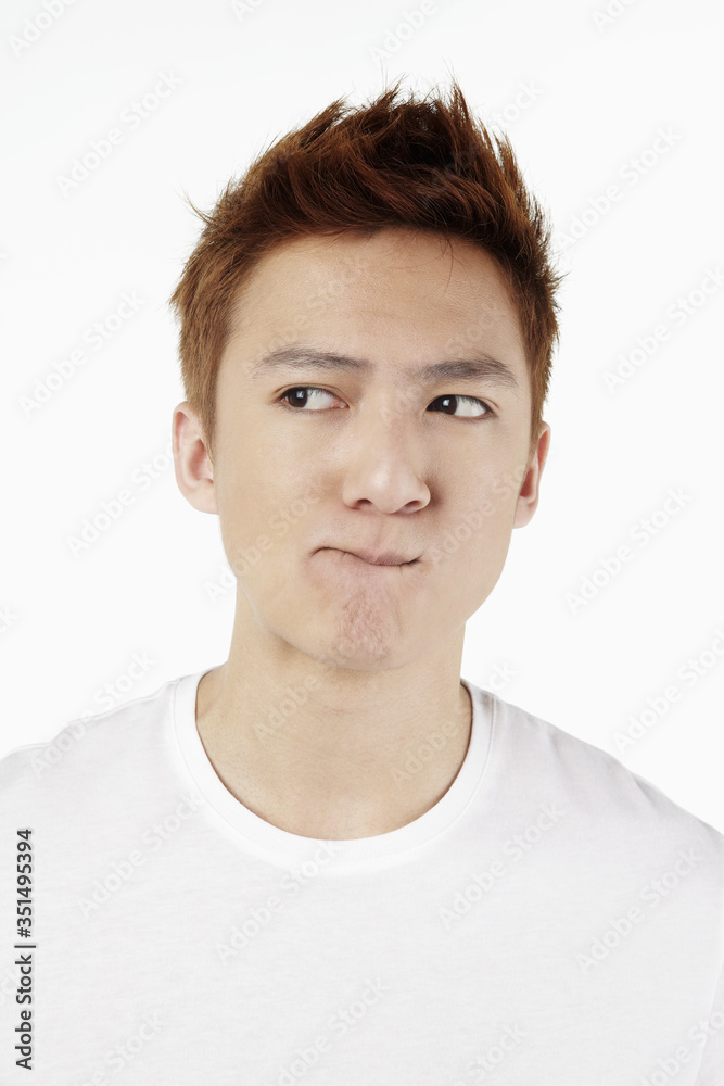 Man looking away making facial gestures Man looking away making facial gestures