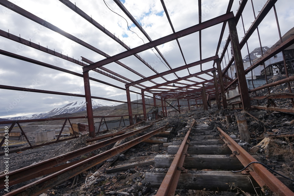 Fototapeta premium Metal remains of abandoned coal mining town on Spitsbergen.