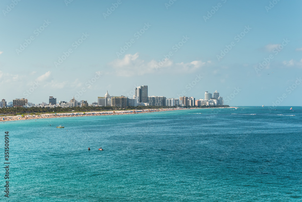 Wide angle view from the sea to the Miami Beach and South Point Park from a cruise ship in Miami, Florida, USA