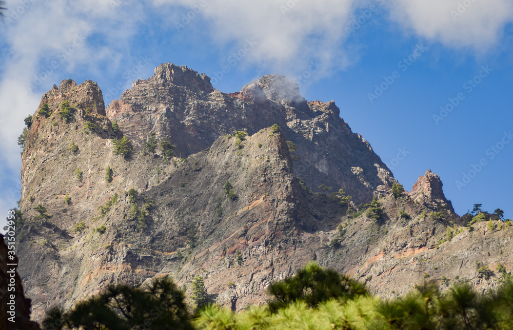 Steep Mountain rocks of El Roque de los Muchachos in Caldera del taburiente, La Palma, Spain.