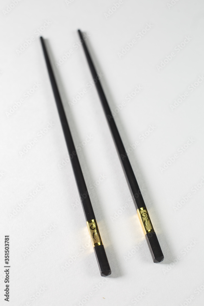 Chinese sticks in black on a white background Chinese sticks in black on a white background