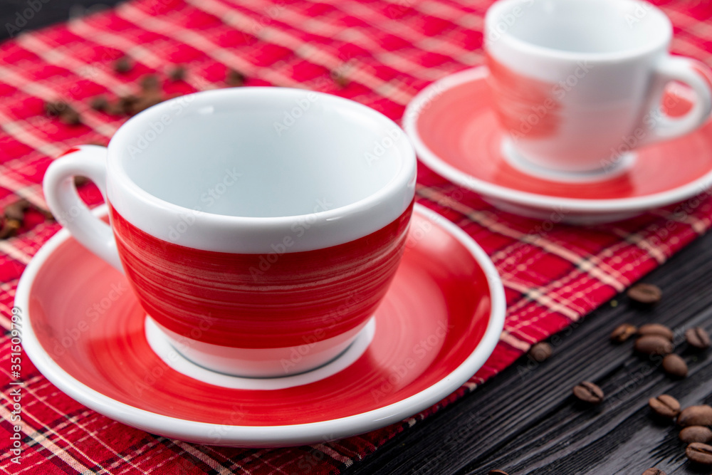 Red coffee cup on black background Red coffee cup on black background