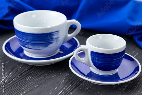 blue cups on a gray background