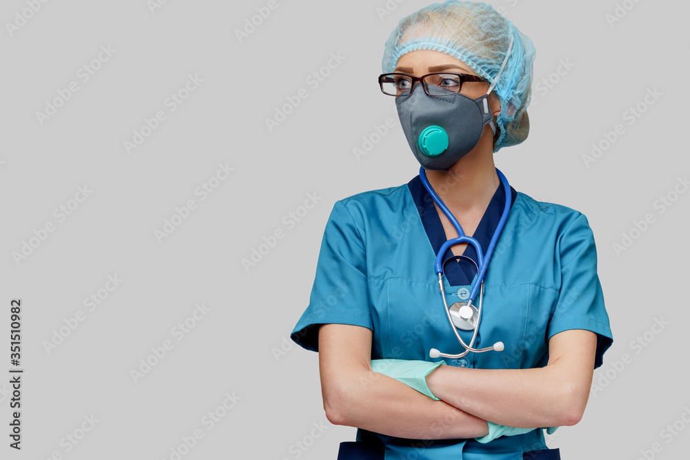 female doctor with stethoscope wearing protective mask and latex gloves over light grey background female doctor with stethoscope wearing protective mask and latex gloves over light grey background
