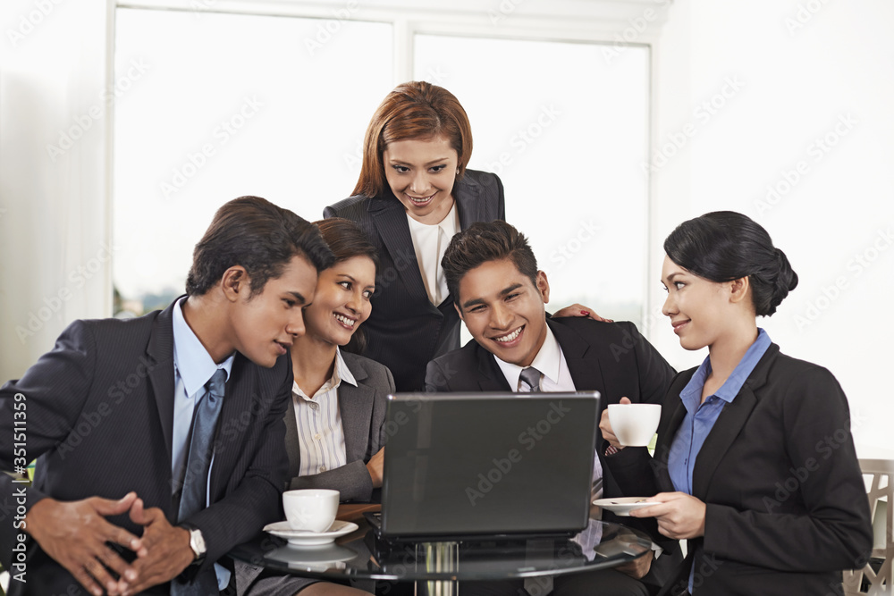 Business people having a discussion during break time Business people having a discussion during break time