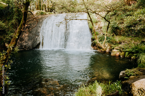 Waterfall in the middle of forest in Galicia