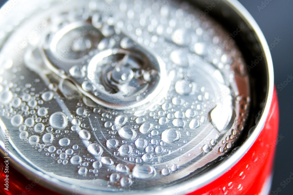 Macro photography of cold popular can drink full of water condensed during hot day. Macro photography of cold popular can drink full of water condensed during hot day.