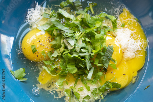 preparing scrambled eggs photo