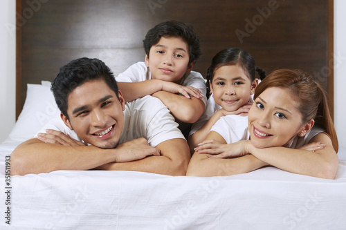 Happy and cheerful family smiling