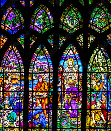 Fotografiet Paris, France - May 20, 2020: Stained Glass Window of St Jean-de-Montmartre in A