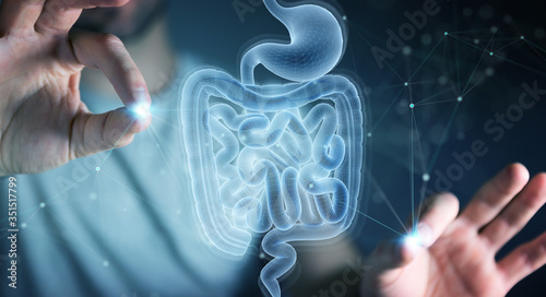 Foto Man using digital x-ray of human intestine holographic scan projection 3D render