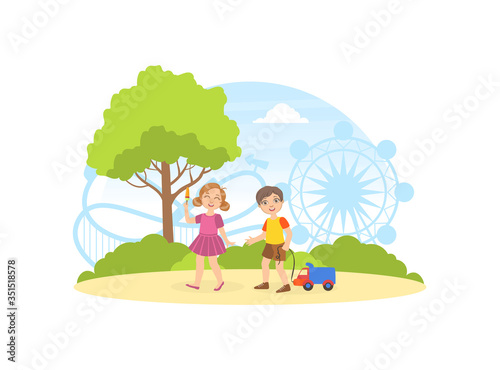 Cute Children Walking and Playing in the Park, Summer Landscape with Carousels and Ferris Wheel Vector Illustration