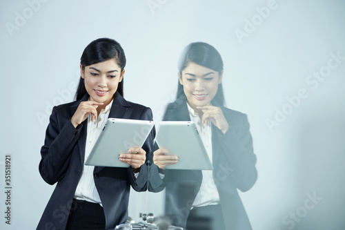 Businesswoman using tablet