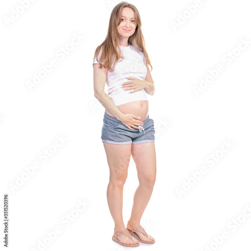 Pregnant woman stomach belly standing smiling on white background isolation