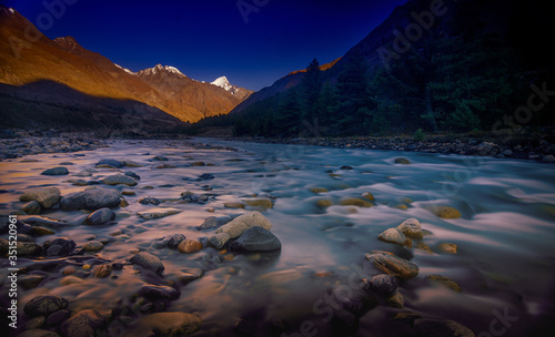 Baspa river view in Chitkul village in Kinnaur, Himachal, India, during sunset photo