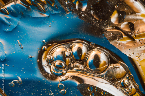Abstract colorful background, Golden yellow bubble, Yellow water bubbles wallpaper, Bubbles macro shot, Closeup bubbles in water, Oil drops on a water surface abstract background. © monus_jr8