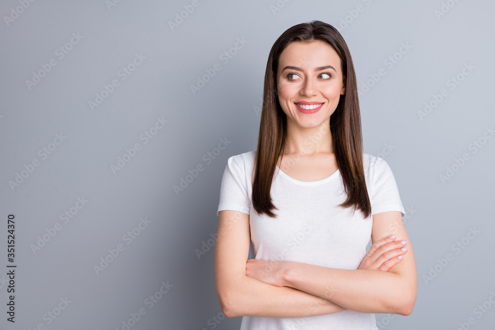 Portrait of nice optimistic content girl cross her hands look empty space listen her colleagues decide decisions solution wear stylish summer outfit isolated over gray color background Portrait of nice optimistic content girl cross her hands look empty space listen her colleagues decide decisions solution wear stylish summer outfit isolated over gray color background
