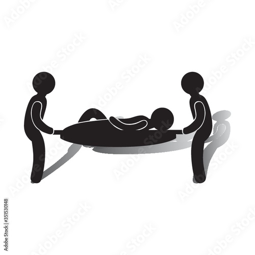 Medics carrying a patient.