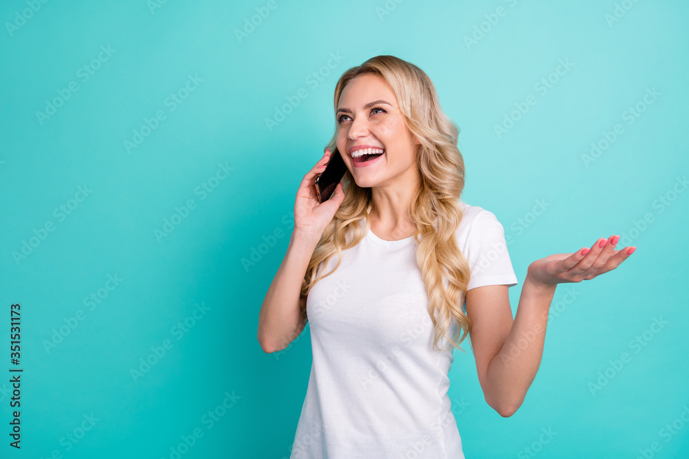 Photo of content girl enjoy weekend holiday call friend smartphone have funny fun talk wear good look outfit isolated over turquoise color background Photo of content girl enjoy weekend holiday call friend smartphone have funny fun talk wear good look outfit isolated over turquoise color background