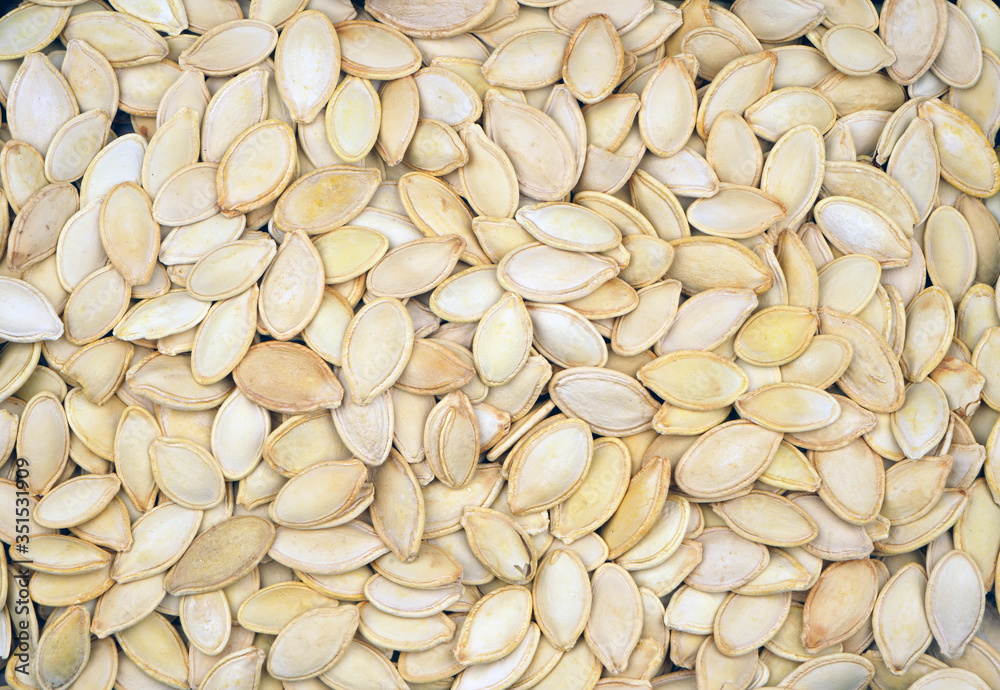 Organic roasted pumpkin seeds. For texture or background. Organic roasted pumpkin seeds. For texture or background.