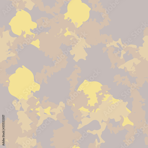 Desert camouflage of various shades of brown, yellow and grey colors
